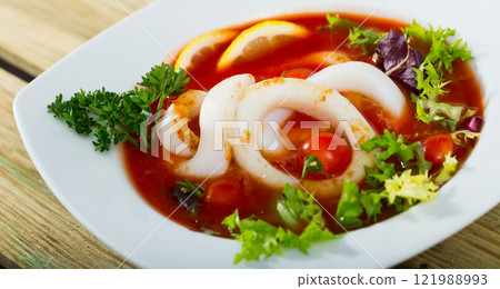 Mediterranean cuisine - tomato soup with squid Mediterranean cuisine - tomato soup with squid 121988993