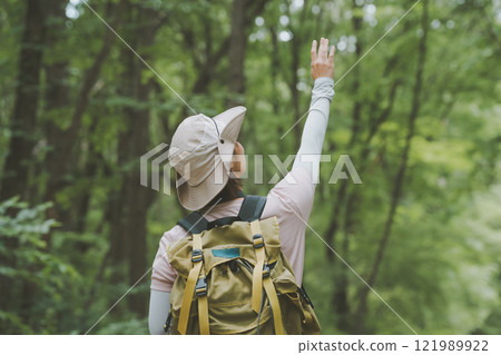 Hitchhiking on mountain trails Hitchhiking on mountain trails 121989922