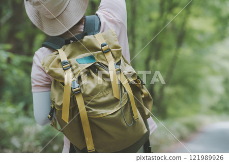 Hitchhiking on mountain trails Hitchhiking on mountain trails 121989926