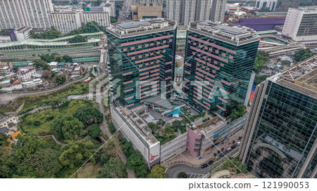 Vibrant Urban Area with Modern Architecture and Green Spaces Dec 22 2024 121990053