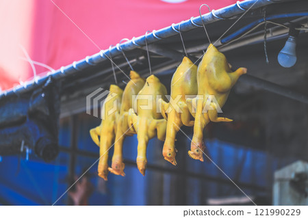 Dec 28 2024 Chickens Hanging at an Open Air Street Vendor Stall, Cheung Chau Dec 28 2024 Chickens Hanging at an Open Air Street Vendor Stall, Cheung Chau 121990229