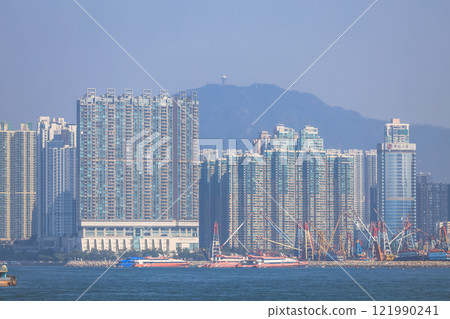 Dec 28 2024 Modern City Skyline with Skyscrapers and Waterfront View. HK Dec 28 2024 Modern City Skyline with Skyscrapers and Waterfront View. HK 121990241