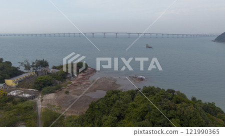 Coastal View with Bridge Crossing Over Calm Blue Waters Tai O Dec 31 2024 121990365