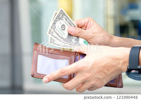 Women hold money in wallets, backgrounds, bags and fashion items.Concept business ideas and shopping 121990448