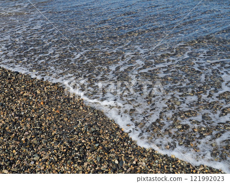 Small stones on the shore 121992023