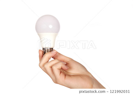 Female hand and LED lamp Female hand and LED lamp 121992031