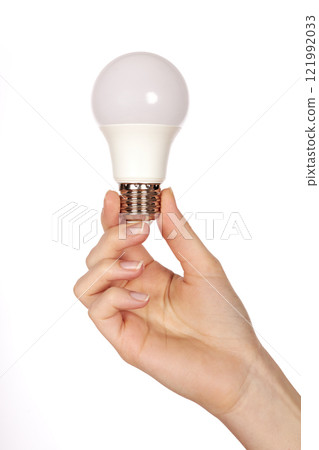 Female hand and LED lamp Female hand and LED lamp 121992033