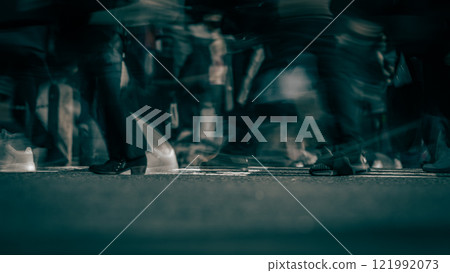Pedestrians moving around Shibuya Scramble Crossing in Tokyo Pedestrians moving around Shibuya Scramble Crossing in Tokyo 121992073