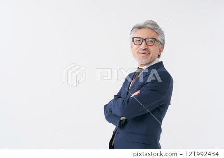 Portrait of a senior man in a suit 121992434