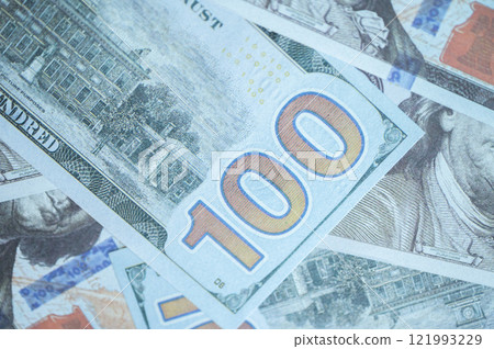 Full frame shot of one hundred dollars banknotes used as background. Full frame shot of one hundred dollars banknotes used as background. 121993229