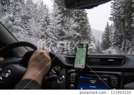 Driving in Snowy Conditions with Navigation 121993230