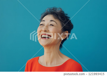 Portrait of a happy smiling senior woman 121993415