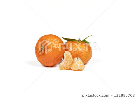 Two orange mandarin and three peeled mandarin slices Two orange mandarin and three peeled mandarin slices 121993708
