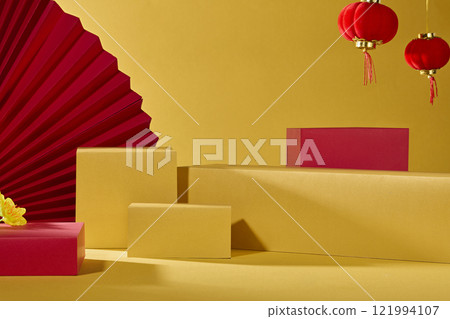 A commercial for a product with a classic New Year theme. A frontal perspective of some rectangular platforms that are empty, with red paper fans and Chinese lanterns hanging on a yellow background A commercial for a product with a classic New Year theme. A frontal perspective of some rectangular platforms that are empty, with red paper fans and Chinese lanterns hanging on a yellow background 121994107