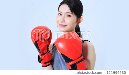 Image of a female boxer 121994380