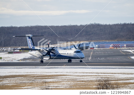 Winter at New Chitose Airport, landing plane, Chitose, Hokkaido 121994867