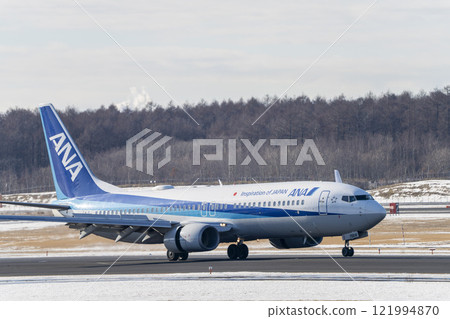 Winter at New Chitose Airport, landing plane, Chitose, Hokkaido Winter at New Chitose Airport, landing plane, Chitose, Hokkaido 121994870