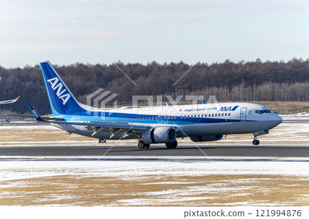 Winter at New Chitose Airport, landing plane, Chitose, Hokkaido Winter at New Chitose Airport, landing plane, Chitose, Hokkaido 121994876