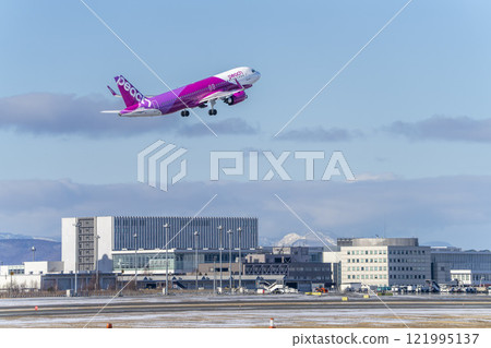 New Chitose Airport in winter, airplane taking off, Chitose, Hokkaido New Chitose Airport in winter, airplane taking off, Chitose, Hokkaido 121995137