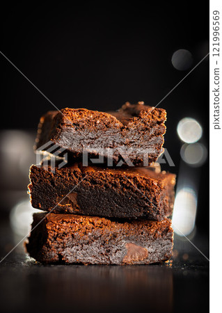 Homemade chocolate brownies on black table. 121996569