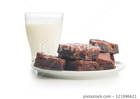Homemade chocolate brownies and milk in glass isolated on white background. 121996621