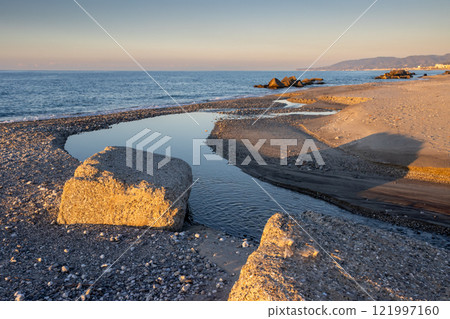 Beach with a small river, Spadafora, Sicily, Italy 121997160