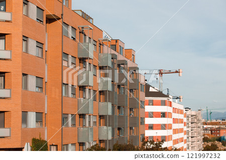 Overview of buildings with individual dwellings for private use in a city. Overview of buildings with individual dwellings for private use in a city. 121997232