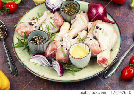 Raw chicken drumsticks. Raw chicken drumsticks. 121997668