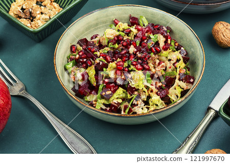 Tasty vegan beetroot and pomegranate salad 121997670