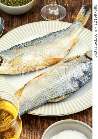 Dried fish stockfish. Dried fish stockfish. 121997699