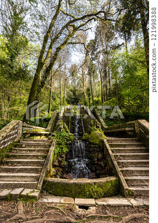 Famous water stairway Fonte Fria in the magical ancient forest of Bussaco in Luso, Aveiro in Portugal 121998388