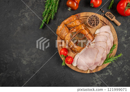 Delicious ham, homemade cut ham on a wooden board, top view. copy space 121999071
