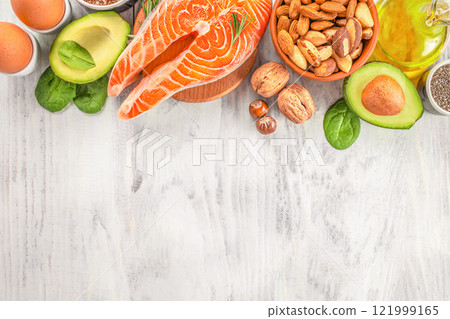 Food sources of omega 3 and omega 6 on white background top view Food sources of omega 3 and omega 6 on white background top view 121999165