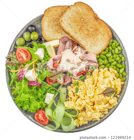 breakfast with ham scrambled eggs, vegetable salad and toast isolated on white background. top view 121999214