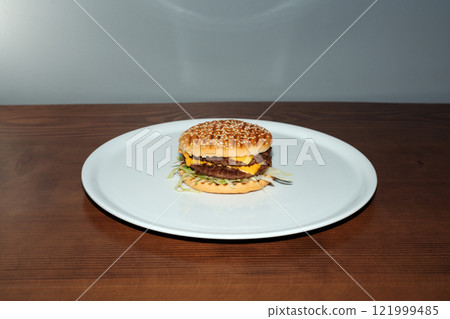 Double cheese burger retro flash food photography. Double cheese burger retro flash food photography. 121999485