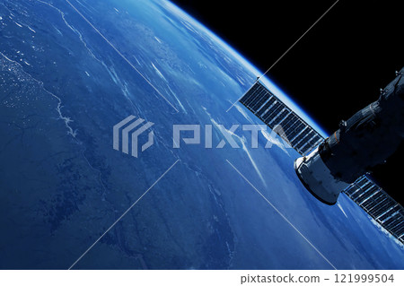 A space satellite above the Earth's surface. Elements of this image furnished by NASA 121999504