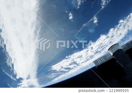 A space satellite above the Earth's surface. Elements of this image furnished by NASA 121999505