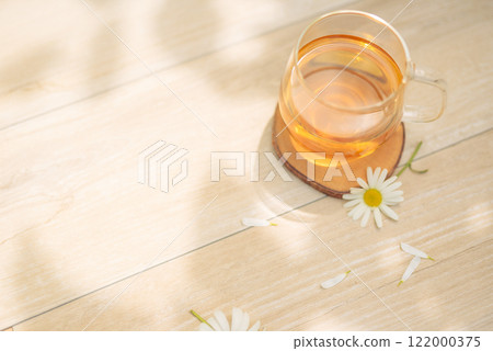 Tea time in the spring sunshine 122000375