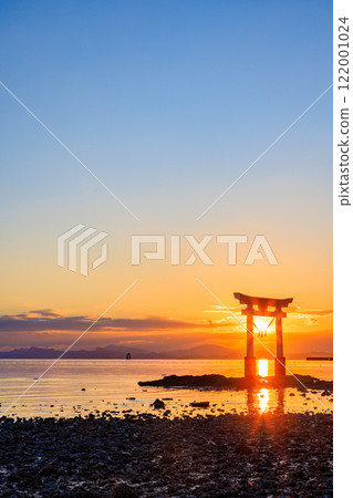 Torii gate and sunset at Nagao Tsurugi Shrine in winter, at low tide, Uki City, Kumamoto Prefecture 122001024