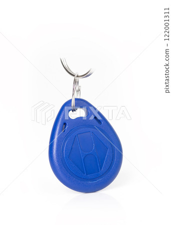 Blue RFID key fob with a metallic keyring, isolated on a white background. secure access systems Blue RFID key fob with a metallic keyring, isolated on a white background. secure access systems 122001311