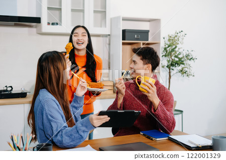 Office worker lifestyle people. business team successful calculating expenses and using laptop. Home office. Work place. Lifestyle. Office worker lifestyle people. business team successful calculating expenses and using laptop. Home office. Work place. Lifestyle. 122001329