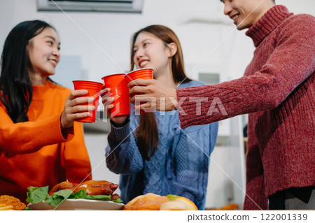 drinks and conversation, social gathering and get together. lifestyle young people, happy and celebrate with food at home. 122001339