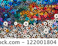 A Collection of Colorful Abstract Patterns Featuring Small Round Objects in Various Designs 122001804