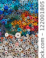 Vivid and Colorful Circular Patterns Created from Various Spools and Decorative Tubes 122001805