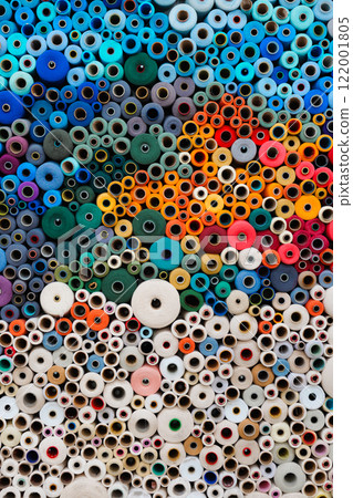 Vivid and Colorful Circular Patterns Created from Various Spools and Decorative Tubes 122001805