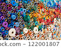 A Vibrant and Colorful Display of Various Spools of Thread in an Artistic Arrangement 122001807