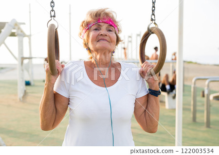 Mature woman with flying rings 122003534