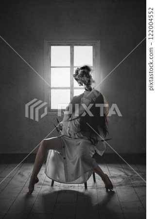Terrifying woman in white gown, long claws, sit on a chair open mouth with black smoke appearing, evoking a sense of possession and dark mysticism. 122004552