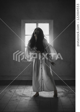 Terrifying woman in white flowing gown, long claws, with open mouth screaming in a darkened room, evoking a sense of possession and dark mysticism. 122004553