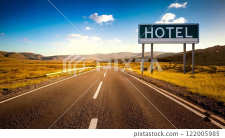 Hotel sign along the highway surrounded by scenic landscape and clear blue sky Hotel sign along the highway surrounded by scenic landscape and clear blue sky 122005985